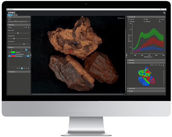 Example of imec's hyperspectral software. A picture of 3 brown rocks being analysed on a screen, on the right side of the rocks you can find statistics.